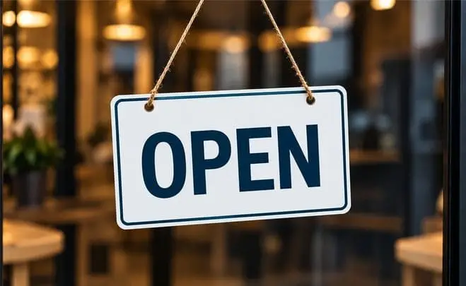 Open sign hanging on a retail shop door